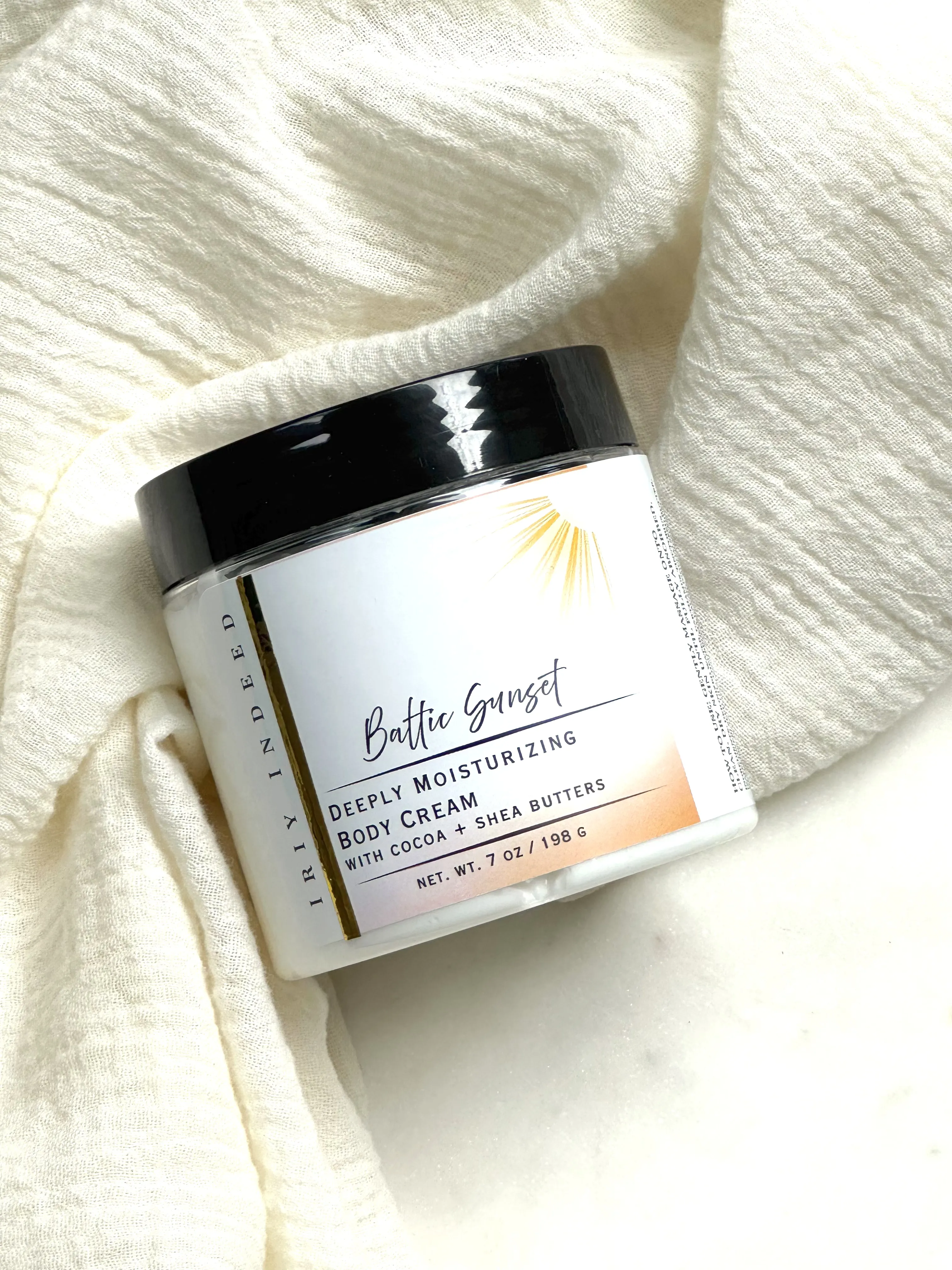Image shows body cream jar 